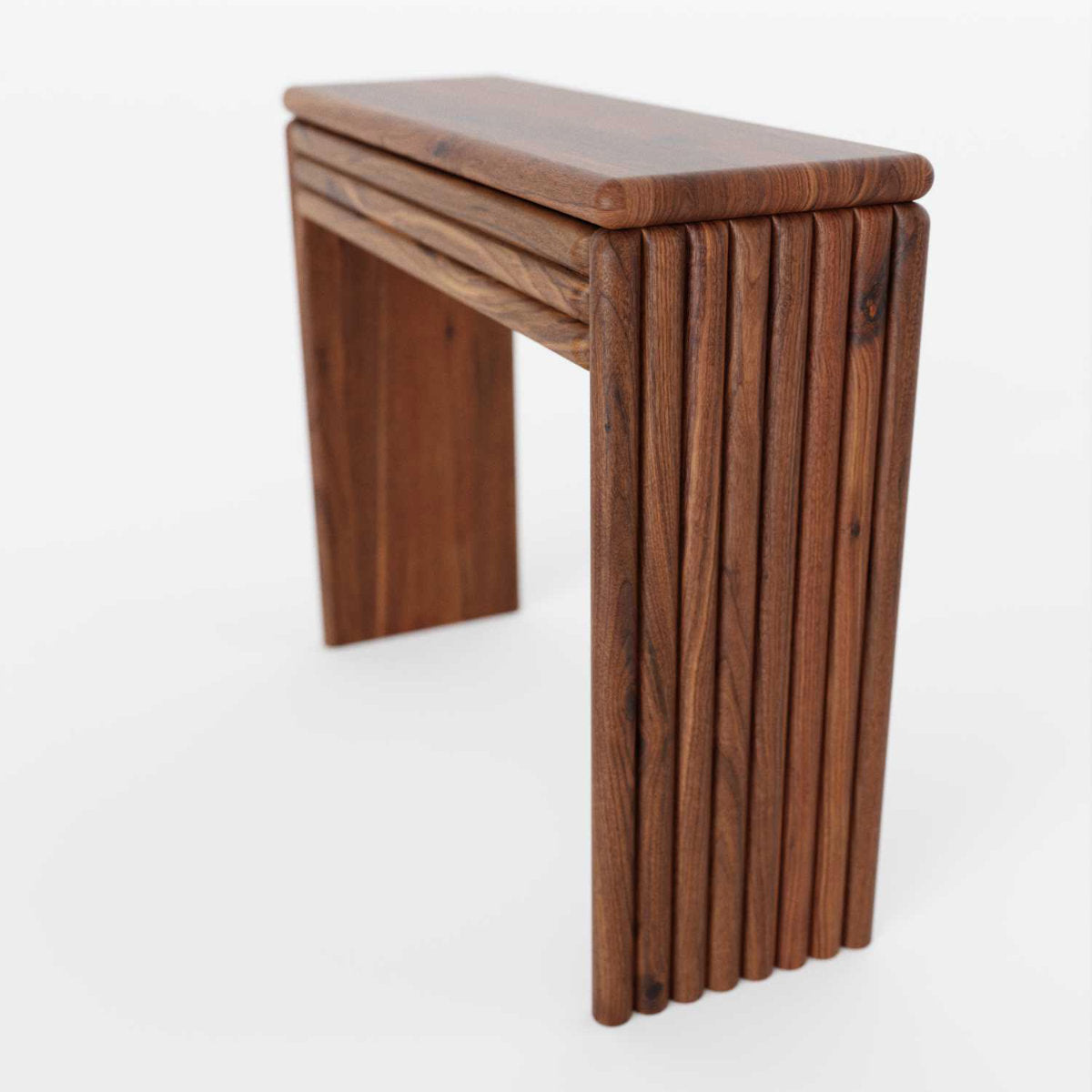 Entry solid wood console with ripple pattern side view