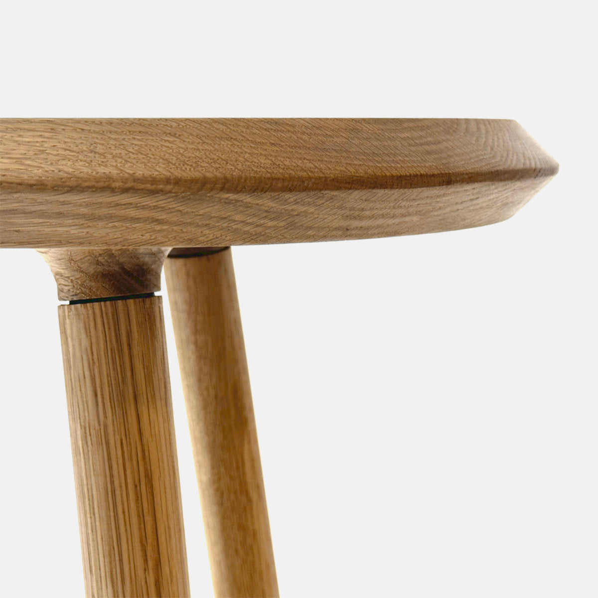 edge of a solid wood bench