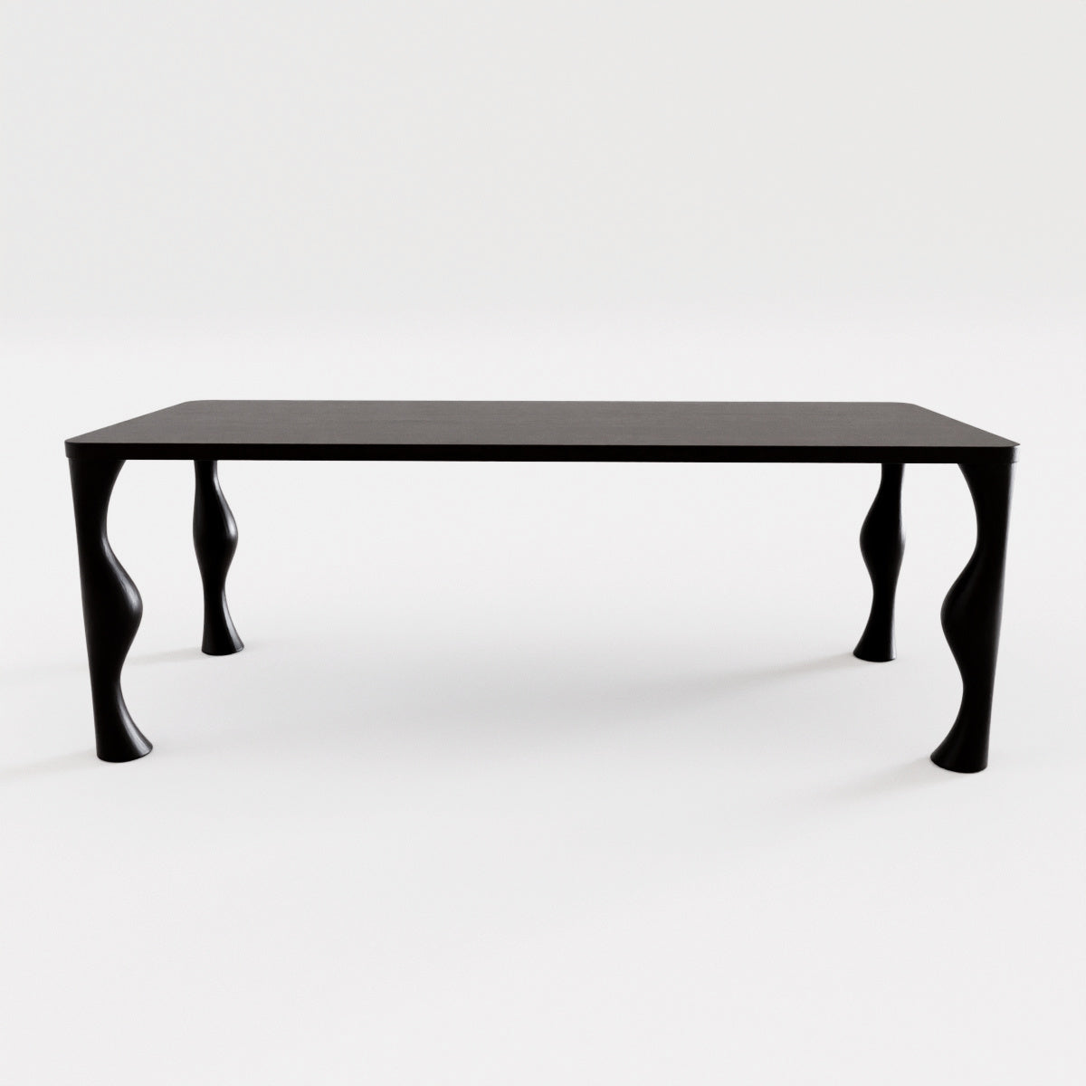 solid wood black table with sculptural legs