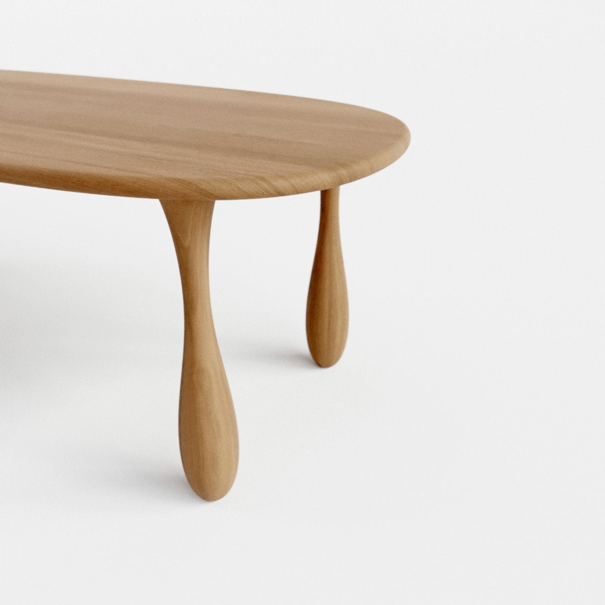 Dining table with Beautifully sculpted drop shaped legs