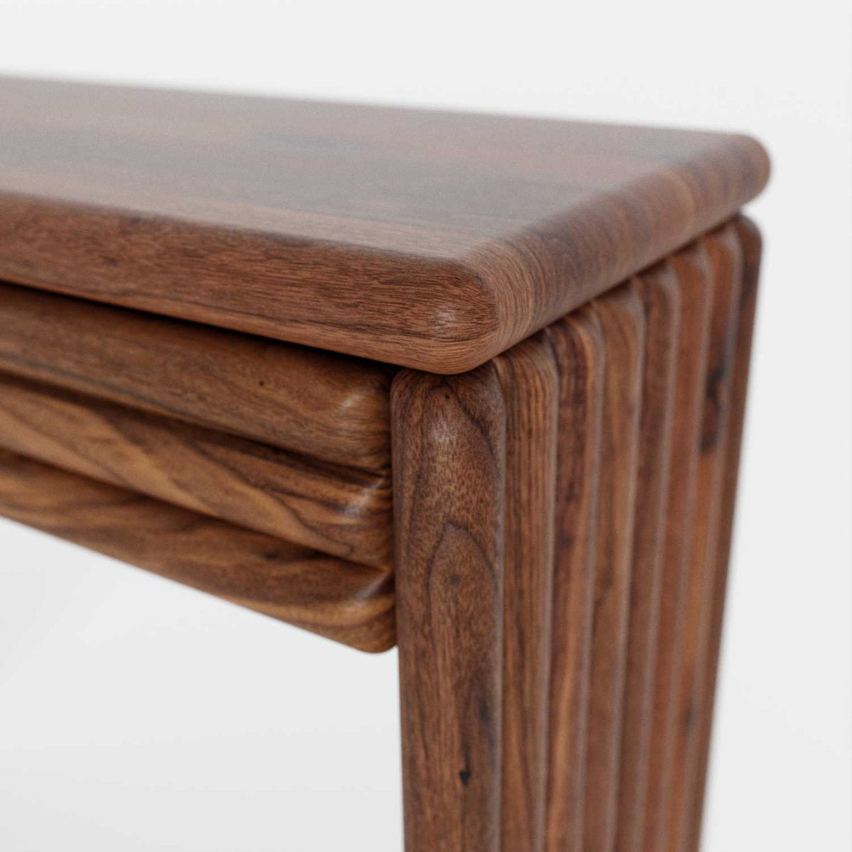 Detail of a walnut wood console