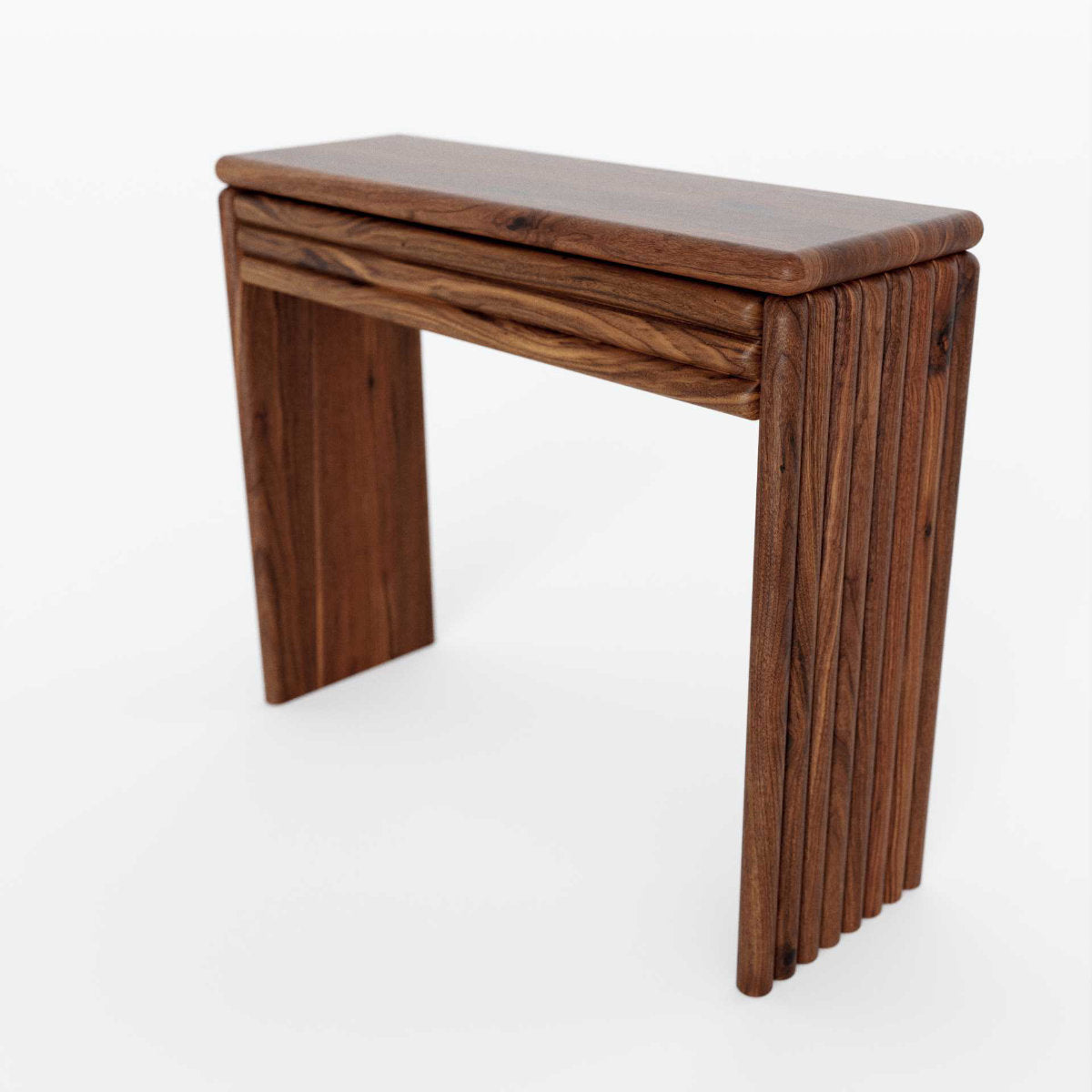 entryway console in solid wood with ripple detail