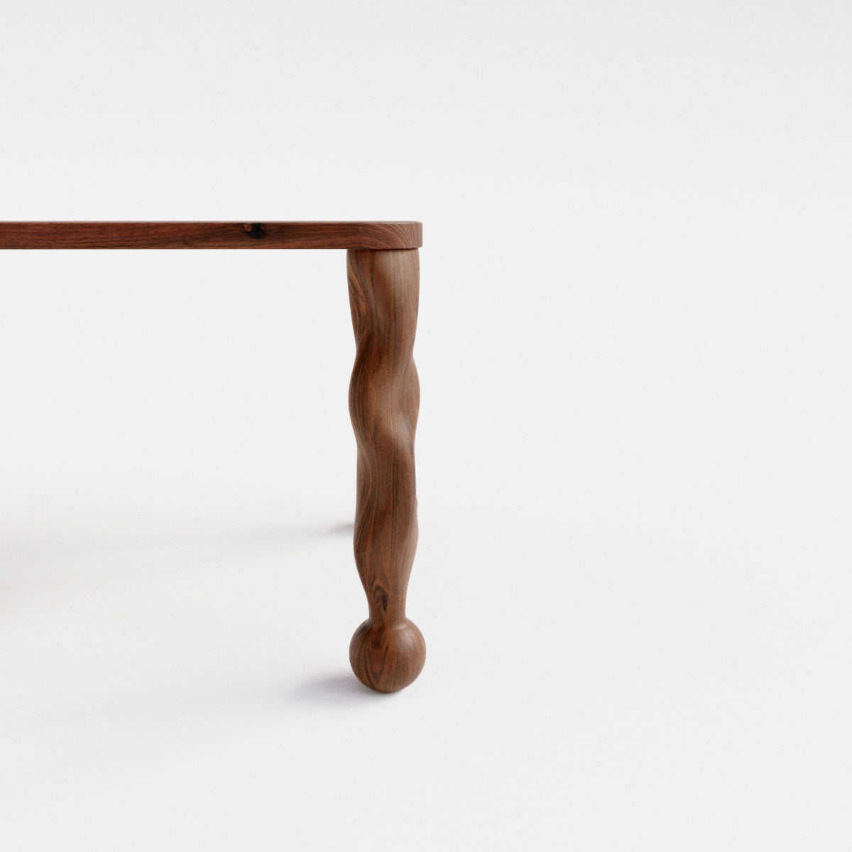 Side view of walnut dining table