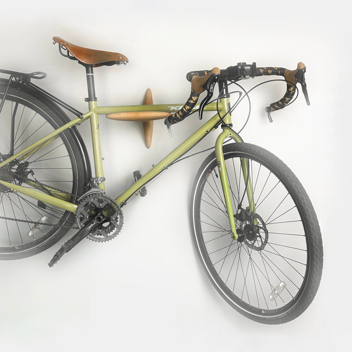 Gravel bike on a wooden bike rack